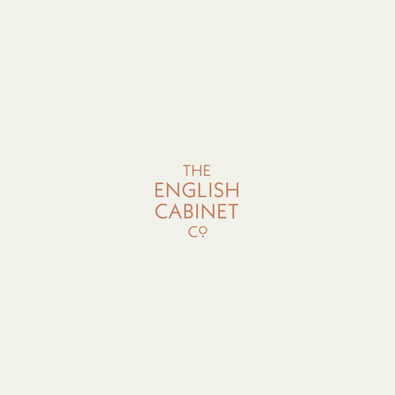 Plain beige background with the text 'The English Cabinet Co.' in central, brownish-orange font.
